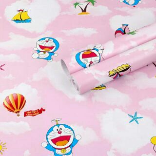 Giấy dán tường đôraemon bãi biển nền hồng, xanh,khổ 45cm*10m (keo sẵn)