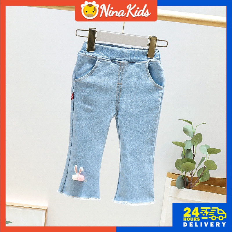 Quần jean dài Nina Kids lưng thun ông rộng in họa tiết chú thỏ dễ thương cho bé từ 0 - 9 tuổi