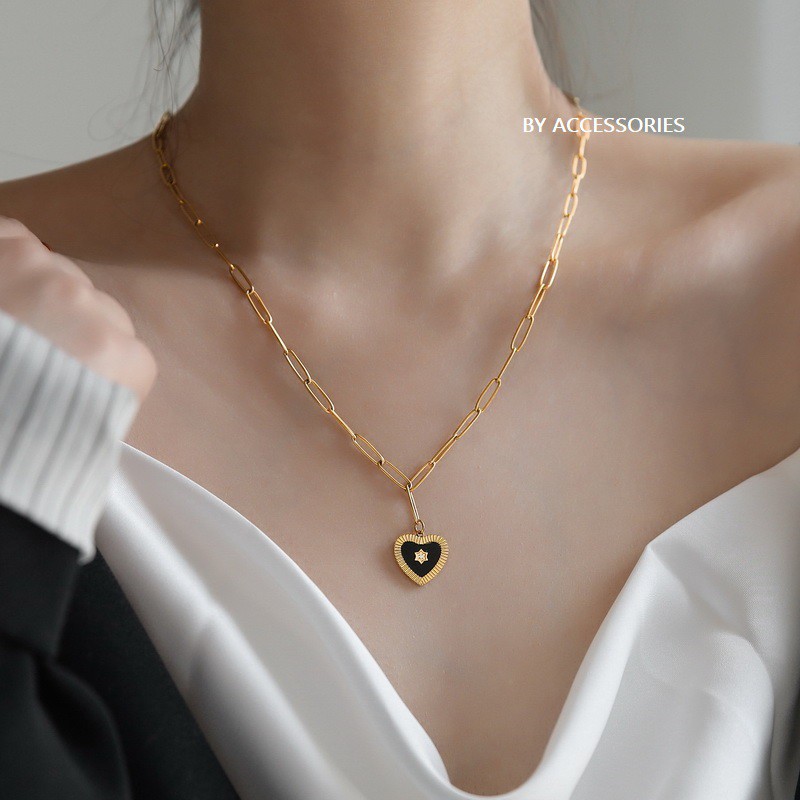 Dây chuyền titan trái tim nền đen phối ngôi sao đính đá không gỉ