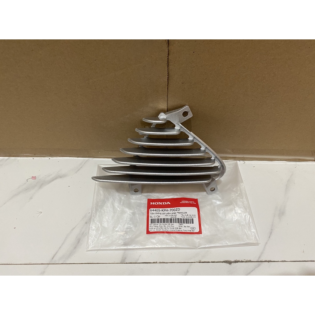 Tấm thông gió yếm phải HONDA FUTURE NEO năm 2005 màu Bạc.