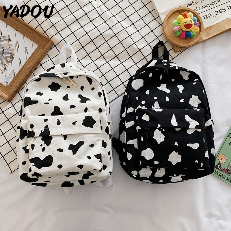 Balo YADOU chất liệu canvas họa tiết bò sữa màu tương phản dễ thương lạ mắt cho học sinh