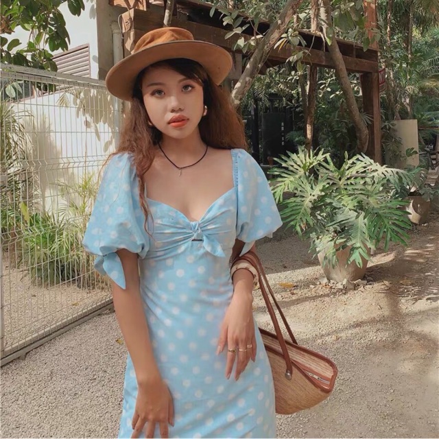 Đầm xanh chấm bi tay nơ