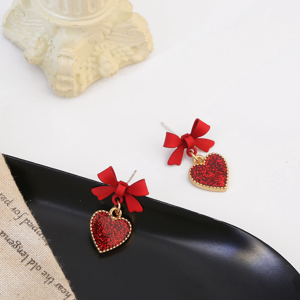 Cặp bông tai hình nơ gắn trái tim màu đỏ đáng yêu cho nữ