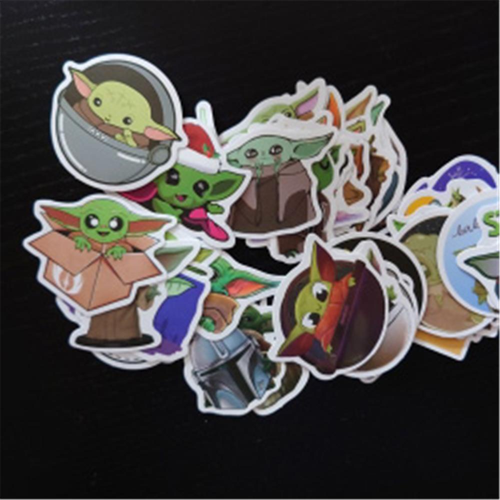 Bộ 50 Miếng Dán Họa Tiết Hoạt Hình Graffiti Dùng Trang Trí Laptop / Ván Trượt / Xe Hơi