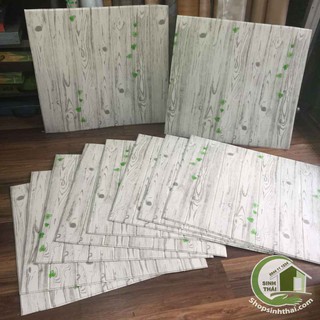 Xốp dán tường giả gỗ màu trắng có dây leo xanh