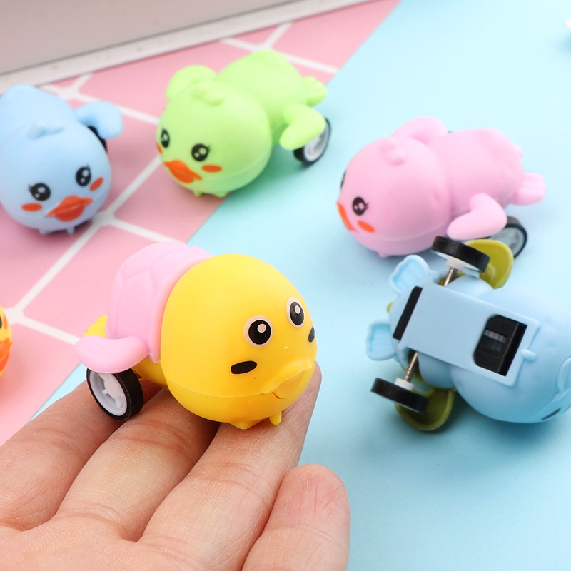 Đồ Chơi Xe Hơi Kéo Lùi Hình Chú Vịt Hoạt Hình Chống Rơi Cho Bé Trai
