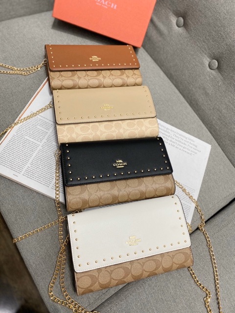 Túi - ví cầm tay viền đinh