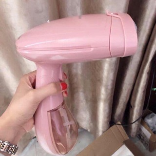 Bàn là hơi nước cầm tay . Đmx