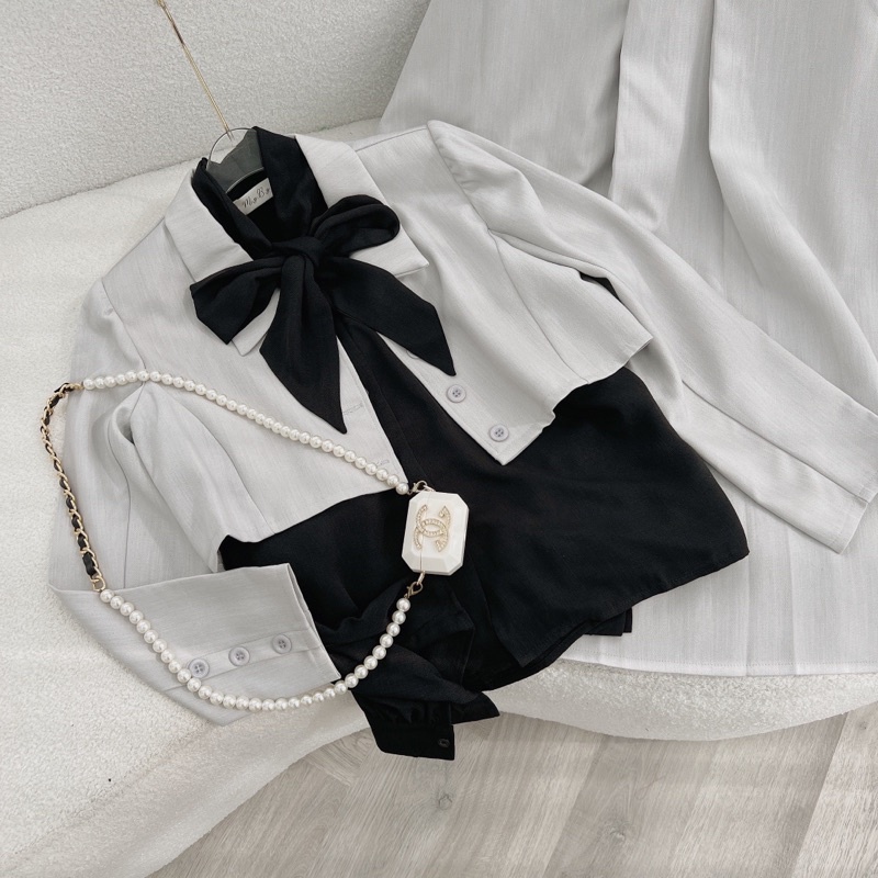 Set áo sơ mi nơ đen kèm chân váy và áo khoác vest croptop