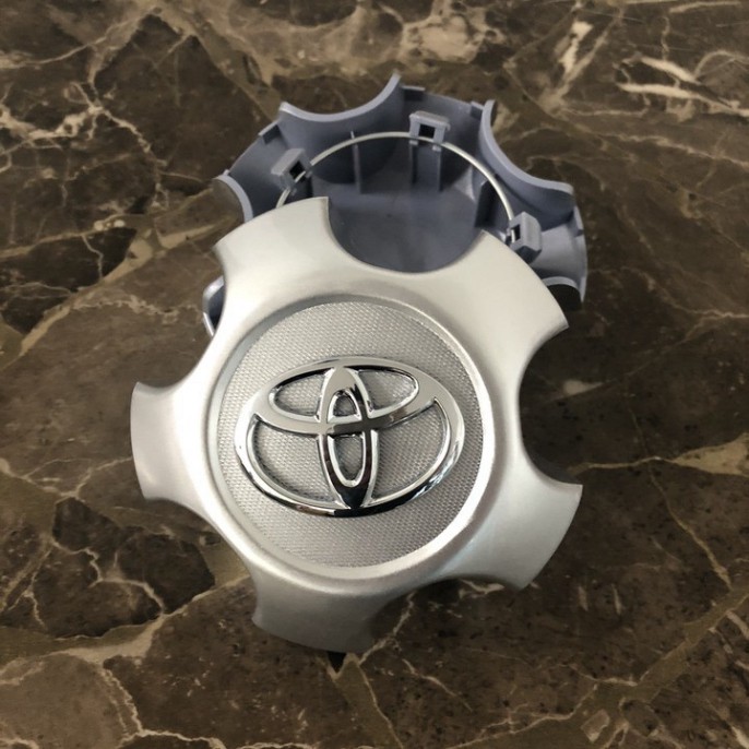 Sản Phẩm Logo chụp mâm, ốp lazang bánh xe ô tô Toyota RAV4 2009-2013 TY-030 .