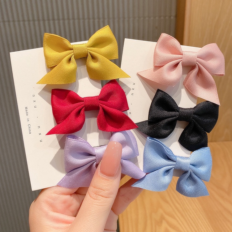 Kẹp tóc hình nơ xinh xắn nhiều màu sắc phong cách Hàn Quốc