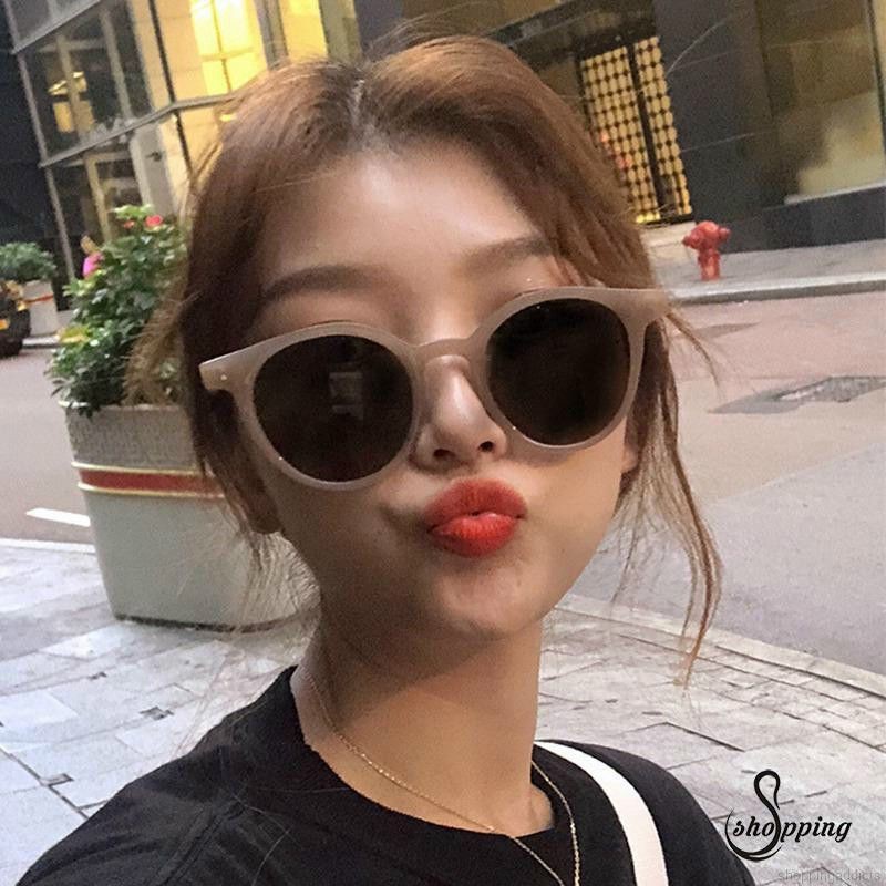 Kính gọng tròn xì tin