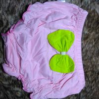 QUần chip gắn nơ bé gái