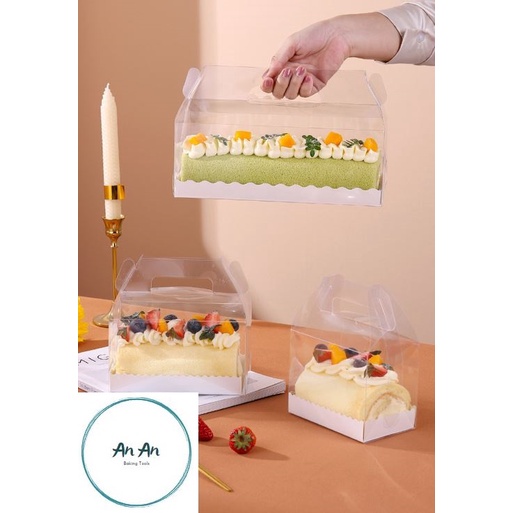 Hộp đựng bánh cuộn bằng mica đế trắng có quai cầm