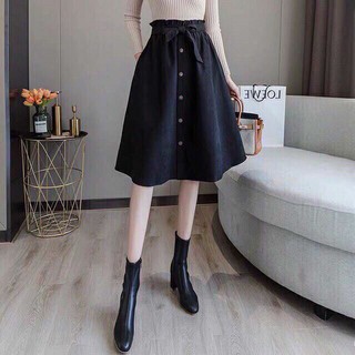 Chân váy xòe phối hàng nút giữ , kèm dây cột nơ eo siêu xinh