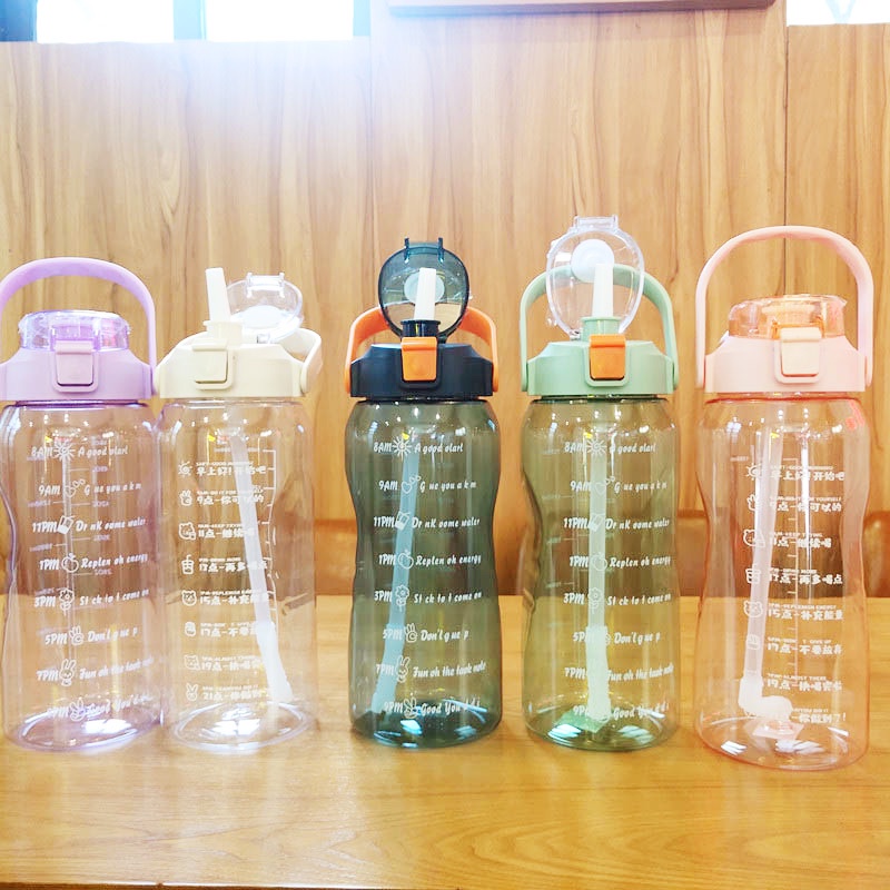 Bình uống nước JUJIAJIA bằng nhựa dung tích lớn 1500ml chống rơi màu gradient có nhãn dán