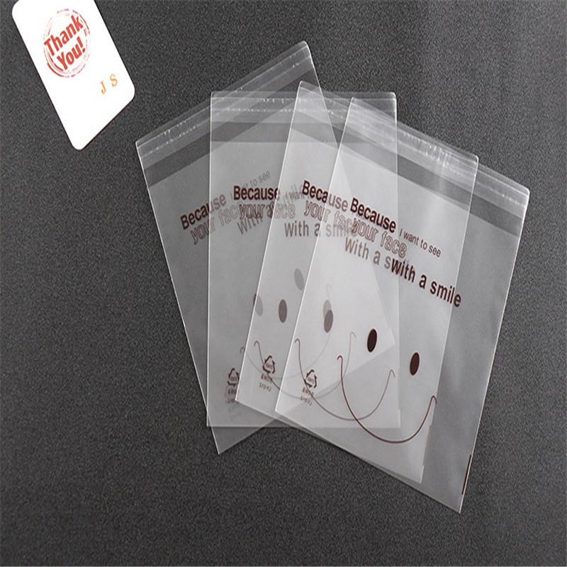Set 100 Túi Đựng Bánh Kẹo Tự Dính Hình Mặt Cười Trong Suốt