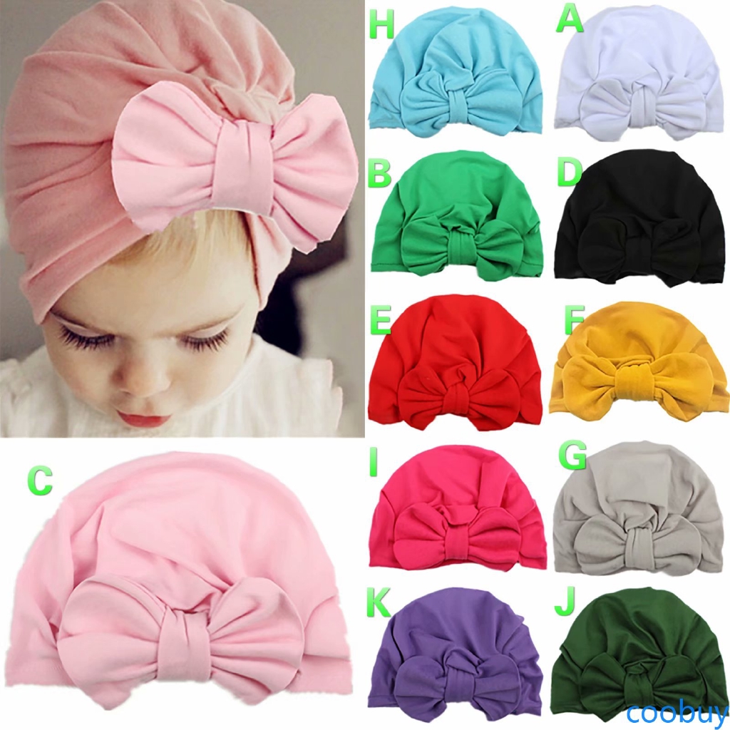 Mũ trùm đầu đính nơ đáng yêu cho bé