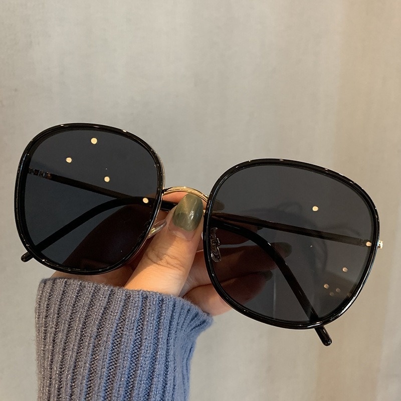 Kính mát gọng tròn chống tia UV thời trang cho nữ