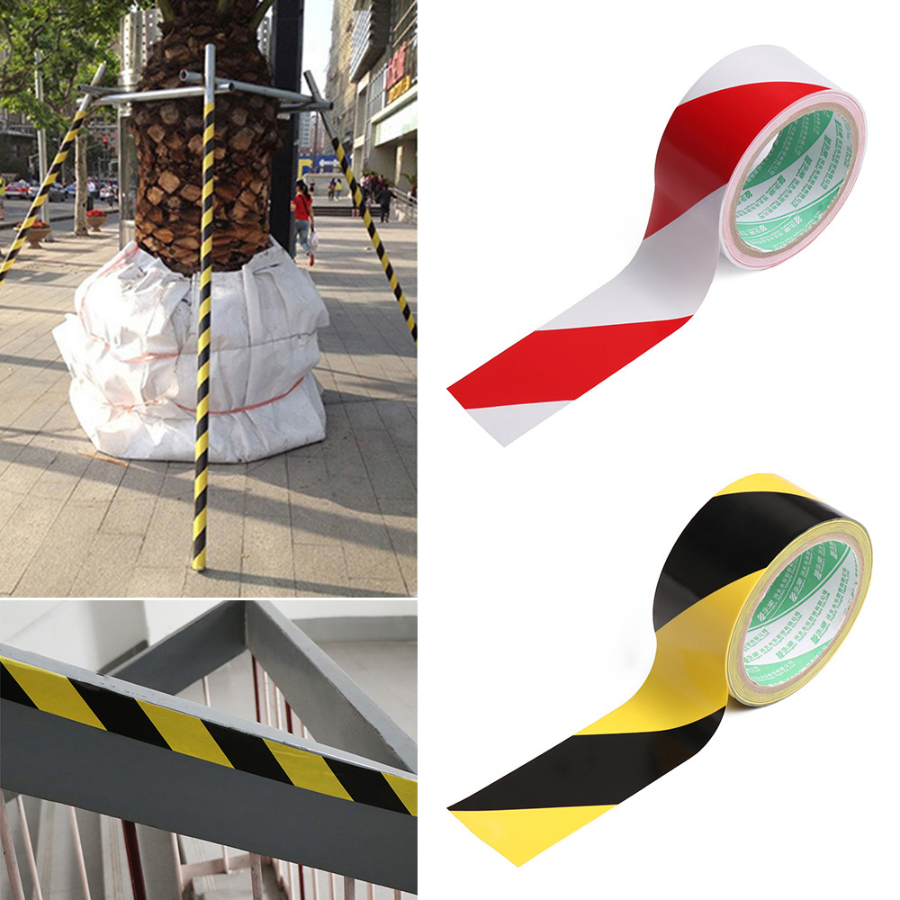Cuộn băng keo tự dính đánh dấu cảnh báo sự nguy hiểm trên đường màu đen và vàng