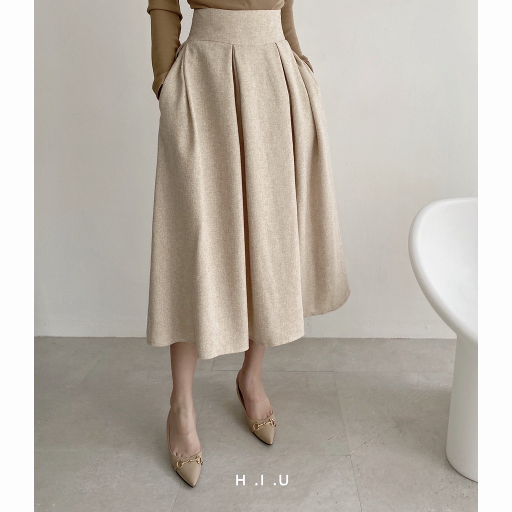 Chân váy midi Mori skirt tweed H.I.U ROOM, chất tweed Hàn nude muối tiêu, chất liệu dày dặn. HIU desgin 2021