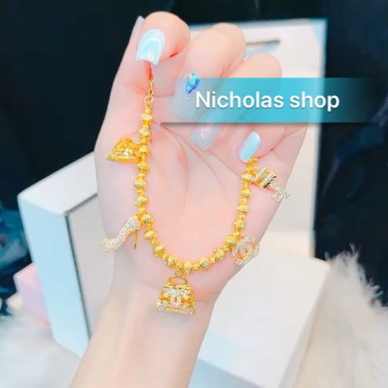 Lắc bi 5 cham hình túi hiệu mạ vàng