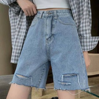 Quần ngố ống rộng màu xanh nhạt tua lai kèm rách