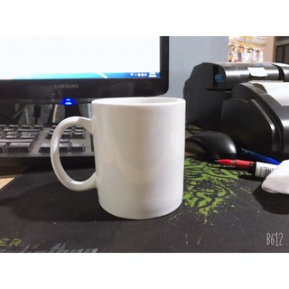 Cốc sứ trắng có quai
