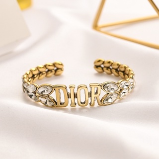 Vòng tay dior bằng thép titan thiết kế đục lỗ thời trang