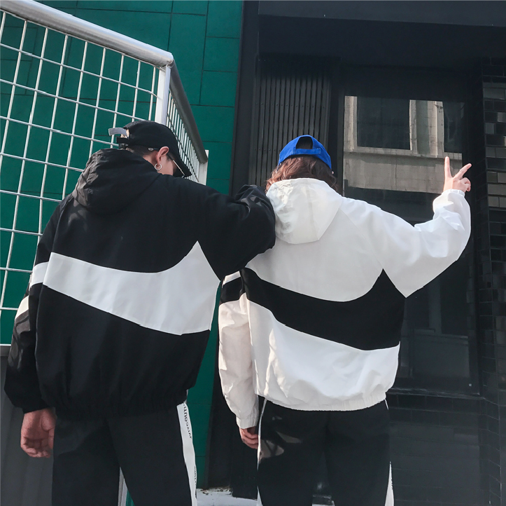 Áo khoác thể thao Nika với thiết kế tương phản đen trắng dành cho nam và nữ | BigBuy360 - bigbuy360.vn