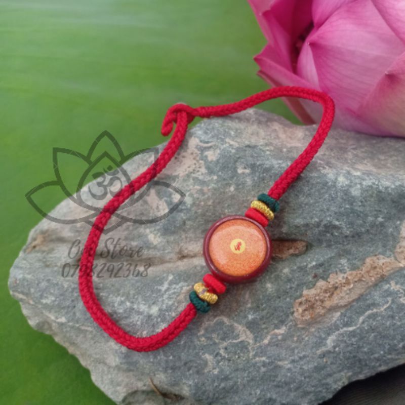 Vòng tay chú Lăng Nghiêm bện chỉ đỏ và đá chu sa