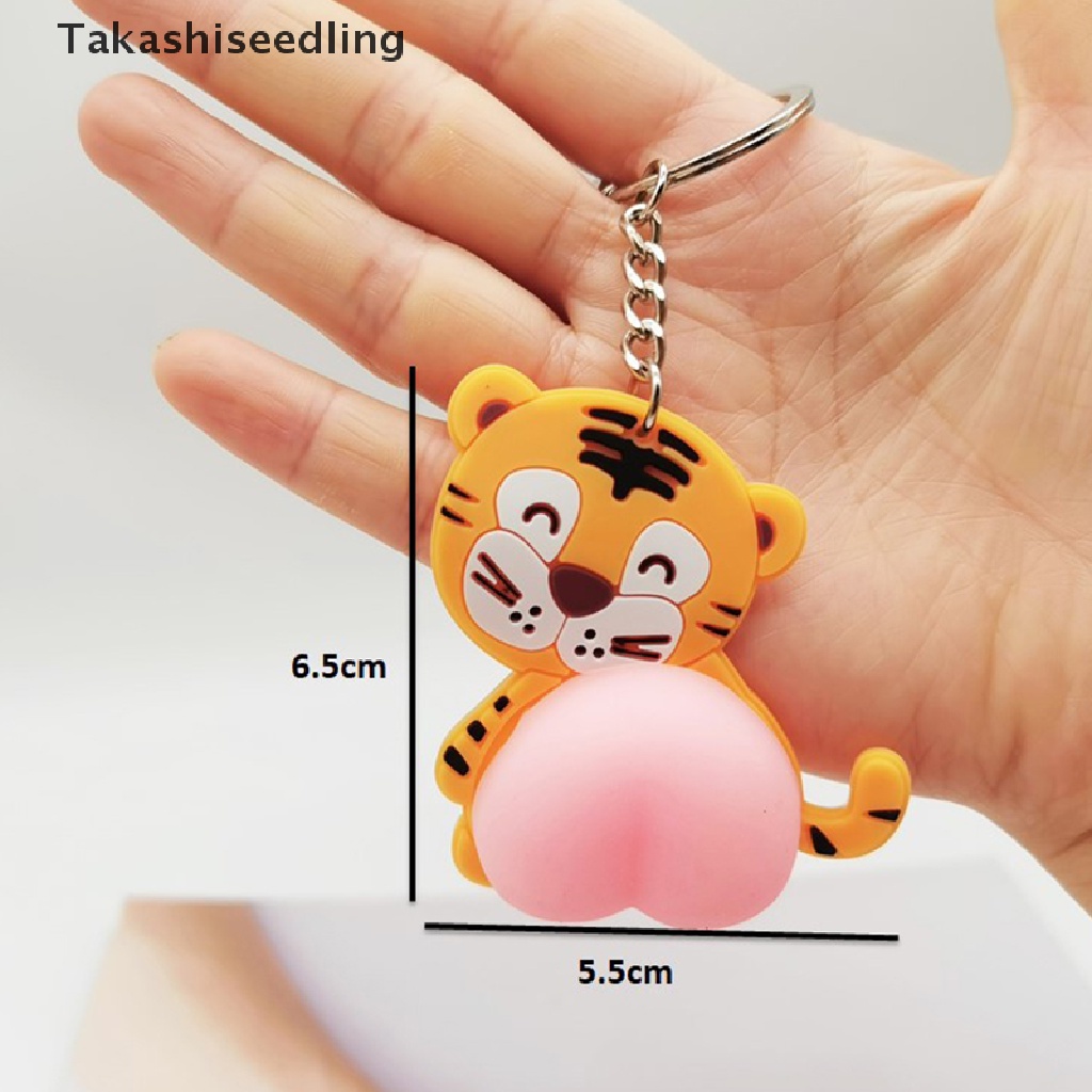 Móc khóa mặt búp bê có mông bóp nén đồ chơi giải tỏa căng thẳng