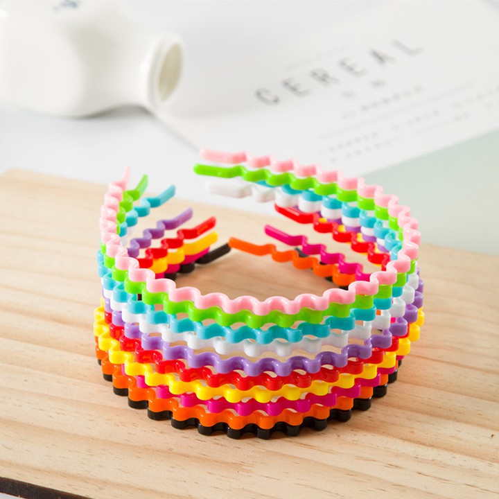 Bờm tóc nhựa lượn sóng nhiều màu đen cho nữ bé gái youngcityshop 30.000