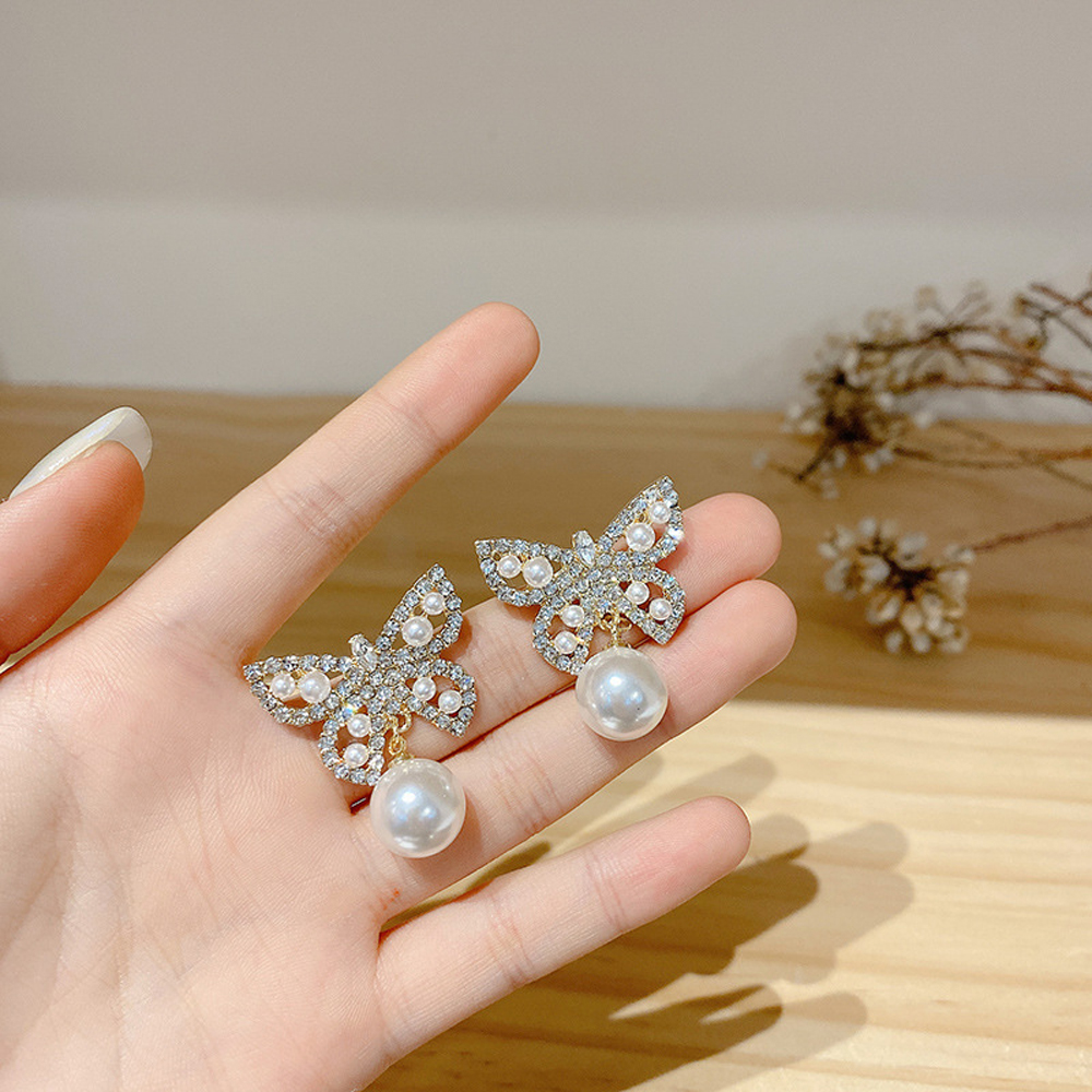 Khuyên Tai Nữ Trang Tạo Hình Độc Đáo