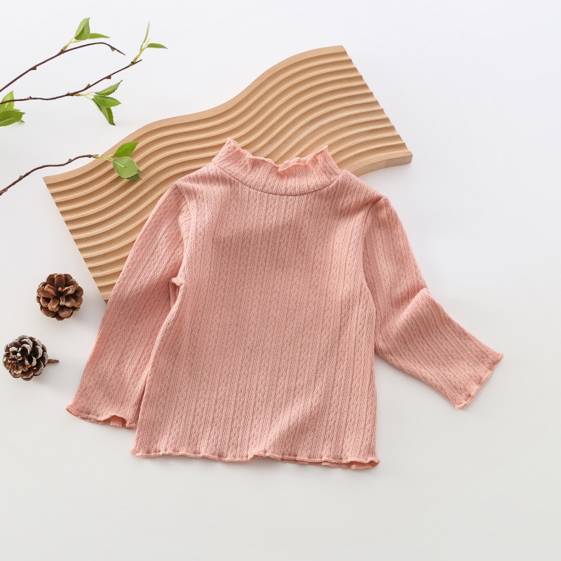 Áo kiểu tay dài cổ lọ chất liệu cotton cho bé gái