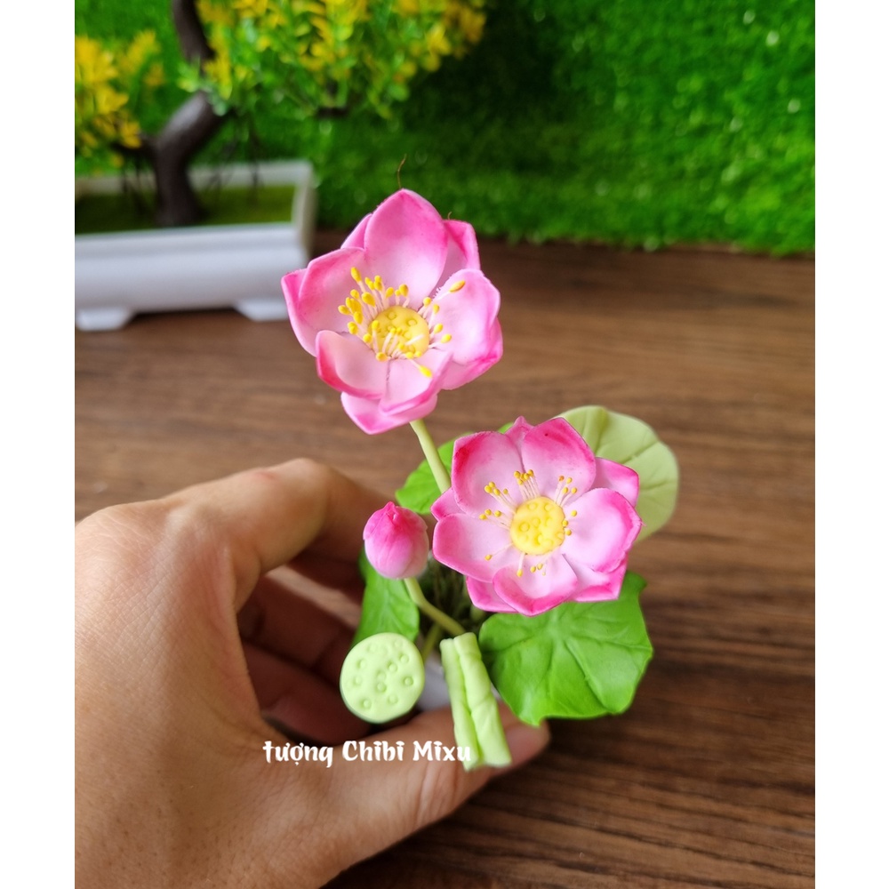 Bộ tượng Tứ Không mẫu đeo chuỗi kèm chậu hoa đất sét và chân đế Tài Lộc Phát