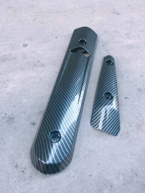 BỘ ỐP PÔ SPARK CACBON gồm 2 miếng nhựa chống cháy cao cấp như hình