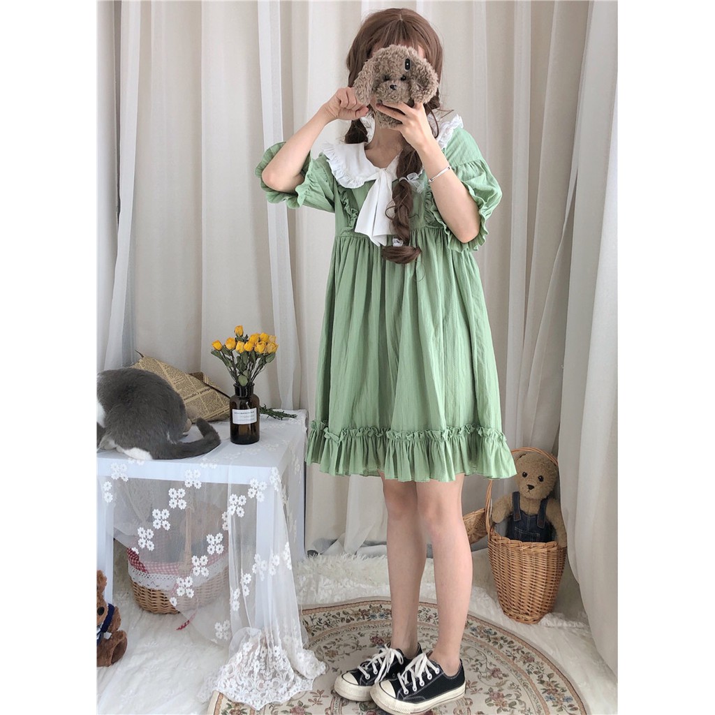 Đầm baby doll tay ngắn tay áo lồng đèn thắt nơ ulzzang ( 2 màu )