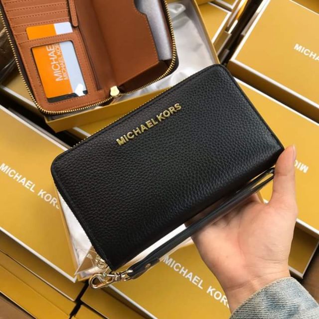 Ví cầm tay michael kors