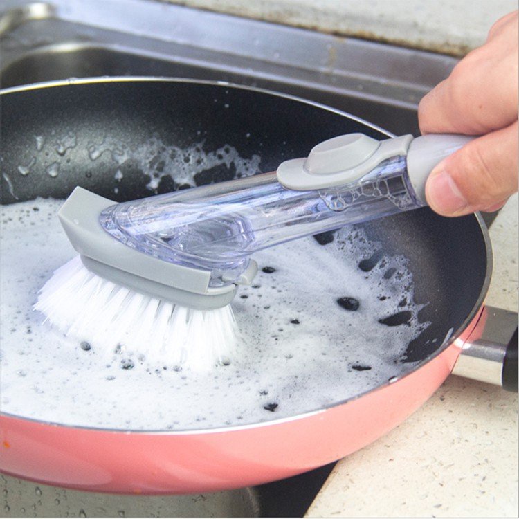 Dụng cụ chùi rửa , chảo, xong, đĩa, bát đa năng có cán tay cầm kèm ngăn chứa xà phòng tiện lợi