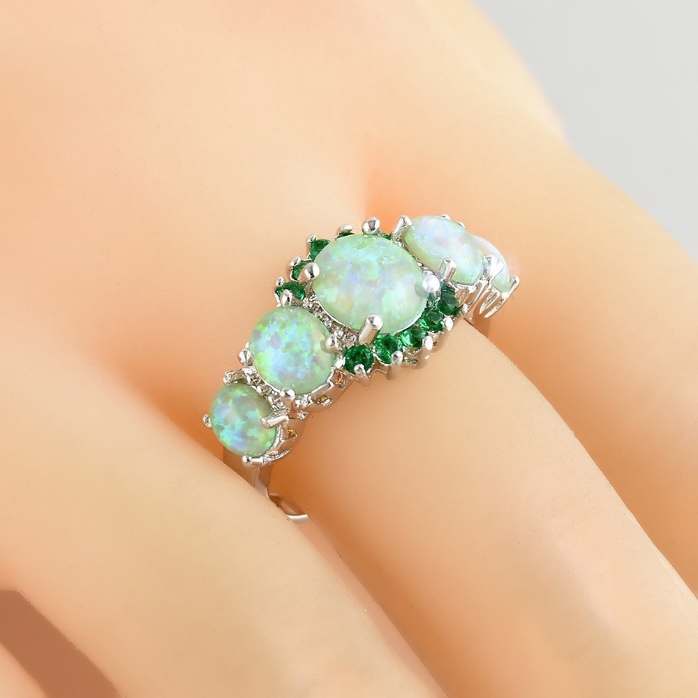 Nhẫn mặt gắn đá opal màu xanh thiết kế đơn giản sang trọng