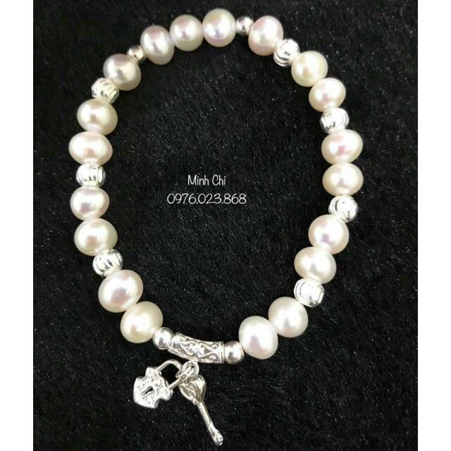 Vòng tay trai nuôi phối charm bạc