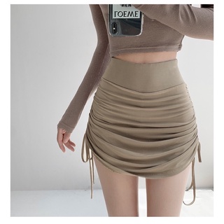 Chân váy xếp ly ngắn rút dây hai bên ôm body lưng cao