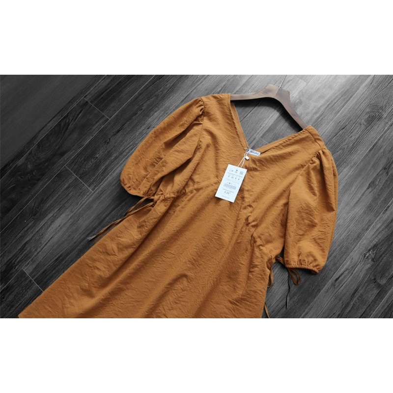 Đầm màu cánh gián dư