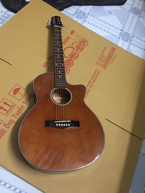 Đàn guitar acoustic + capo fender