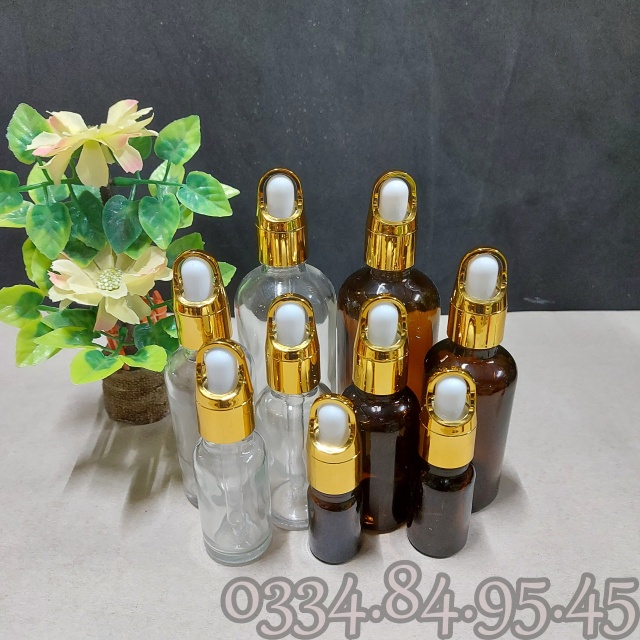 Chai thủy tinh TRONG nắp bóp quai xách vàng, giỏ hoa 5ml 10ml 15ml 20ml 30ml 50ml 100ml - Lọ chiết tinh dầu, đựng serum.