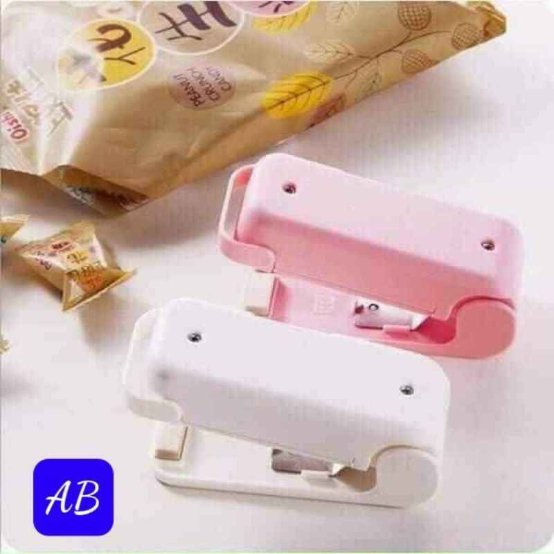 Máy hàn miệng túi mini,dùng pin tiểutiên dụng trong gia đình (a,b)