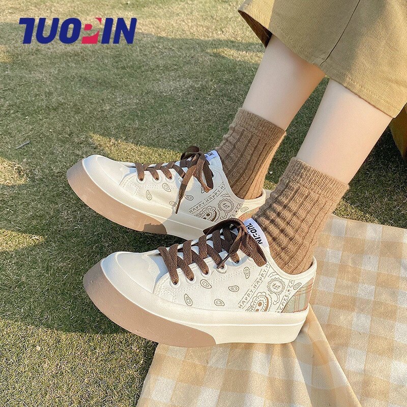 Giày thể thao nữ cột dây hoạ tiết đế viền màu (lùi size form rộng)