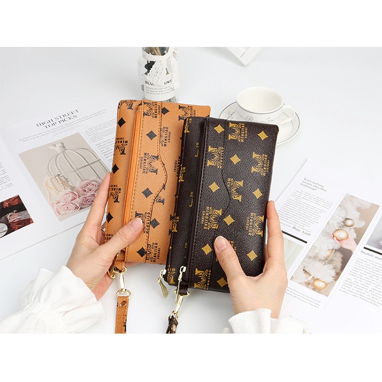 Ví da nữ cầm tay tiện ích 4 ngăn đựng điện thoại,thẻ, tiên mặt - Ví nữ Hot trends 2021