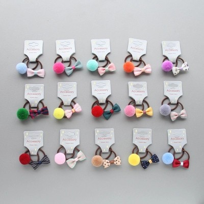 Set 2 Dây Cột Tóc Co Giãn Đính Nơ Và Bóng Lông Mới Cho Bé Gái